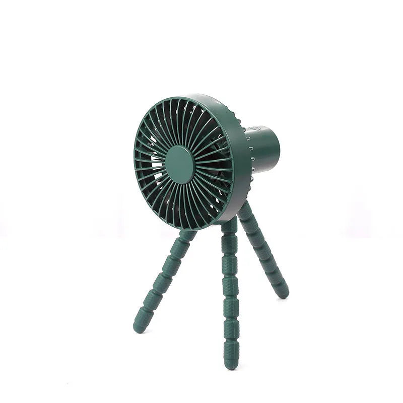 USB rechargeable portable desk fan with flexible octopus tripod and white colour option on a wooden table.