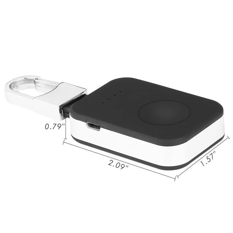 Black portable keychain power bank for wireless charging of Apple Watch on a white background.