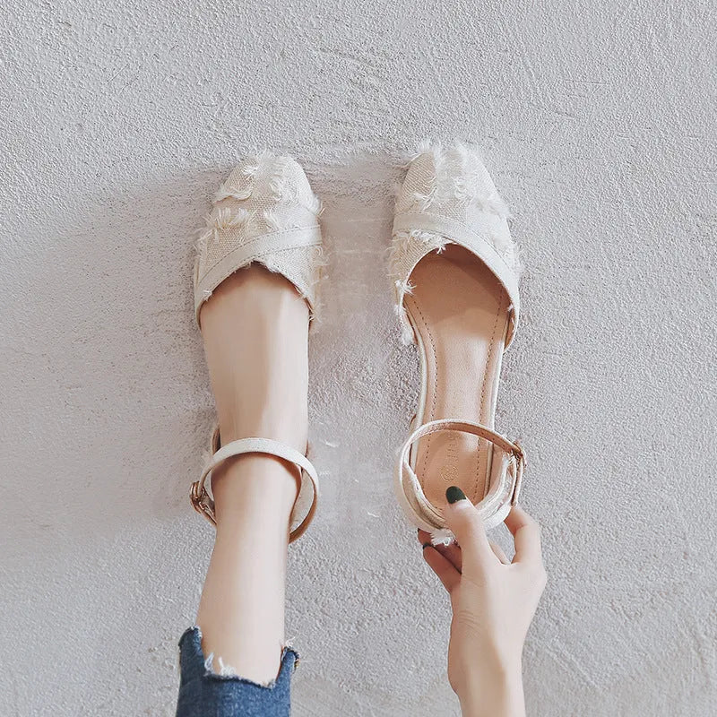 Women's apricot suede D'Orsay flat shoes with an ankle strap and a low rubber sole.