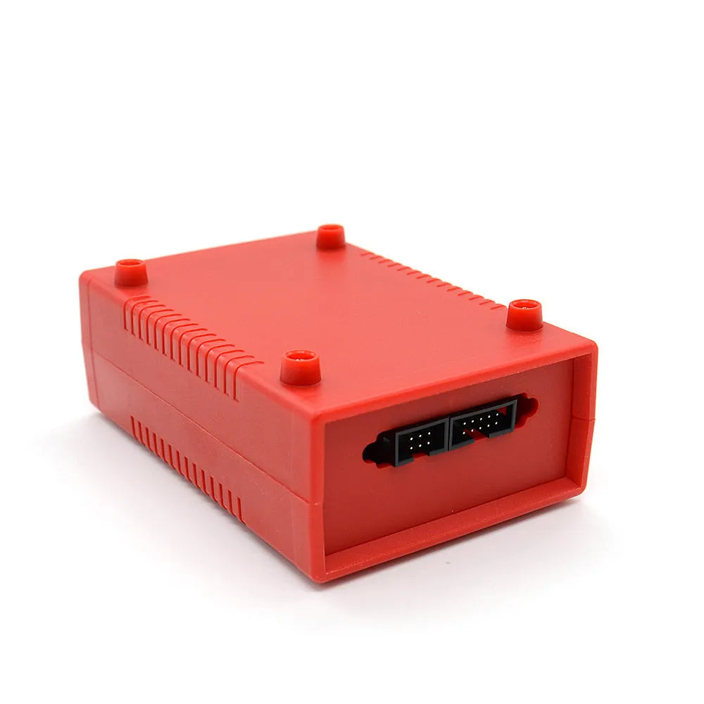 Red anti-theft key matching instrument car fault diagnosis tool on workshop bench