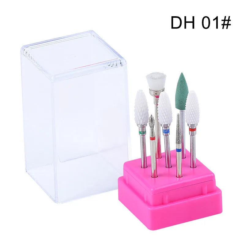 Tungsten steel nail art drill bit set with six bits, one brush, in a clear case.