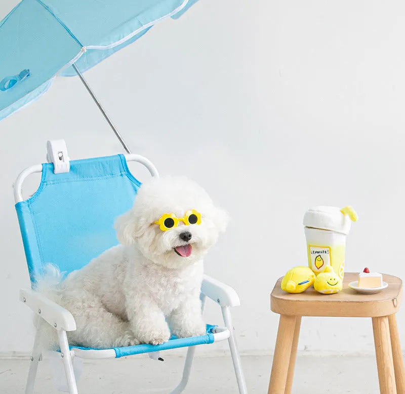 Yellow plush lemon tea cup pet toy with snack pocket, BB call squeaker, and separate cup component.