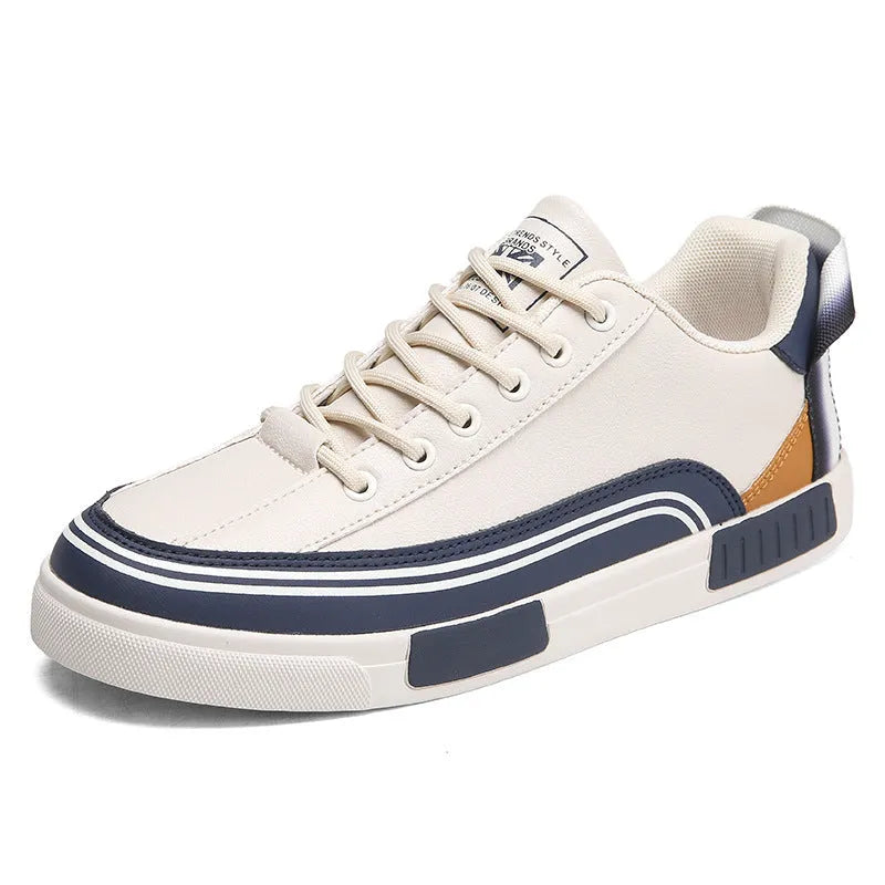 Men's white and green canvas casual shoes with mesh panels and a flat heel.