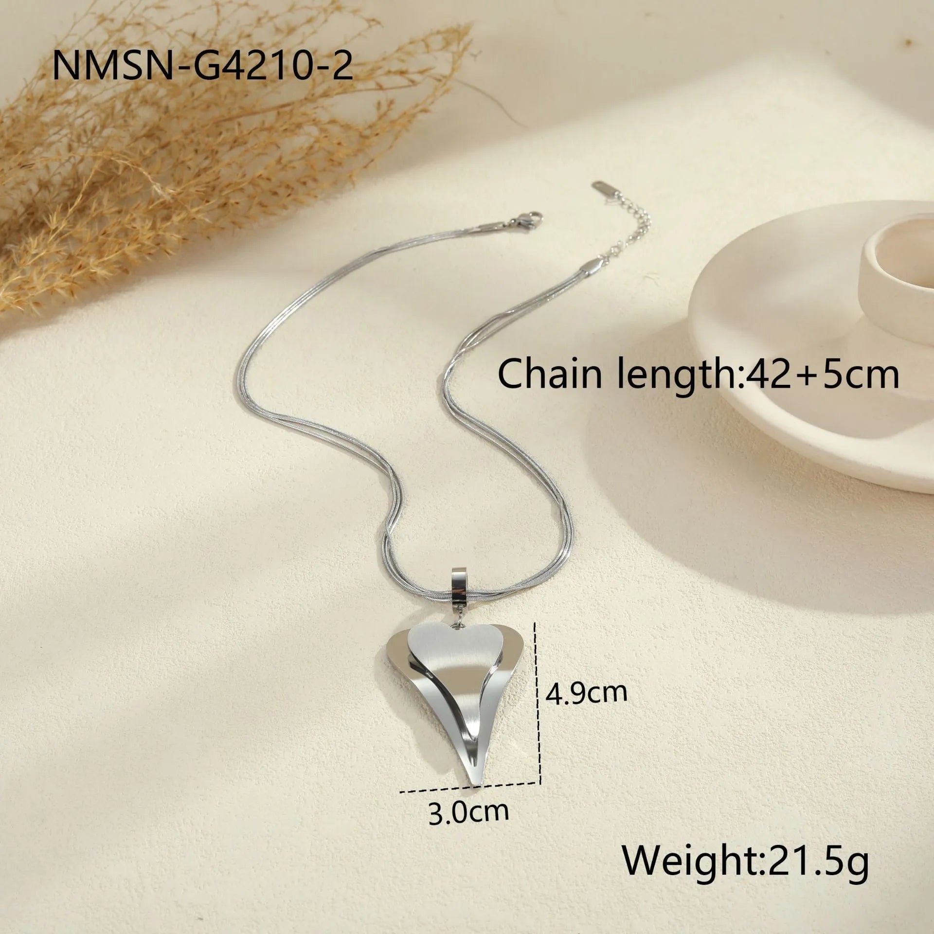 Stainless steel geometric snake bones chain necklace with double heart pendant in gold finish