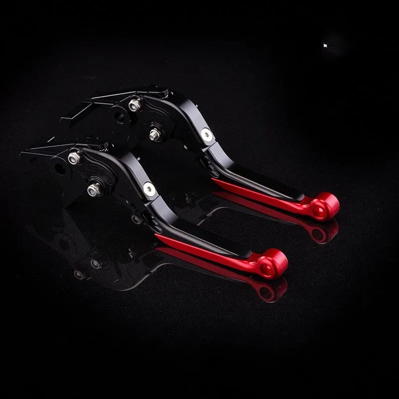 Pair of anodised metal motorcycle horn handle clutch levers with six-speed adjustable length, shown in a selection of colour finishes