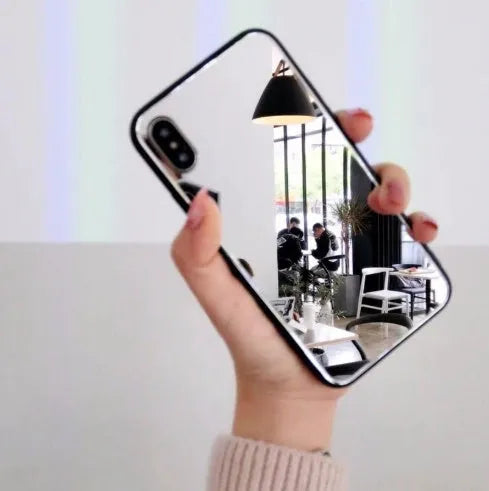 Black compatible iPhone case with a mirror on the back, for models like iPhone X and 11.