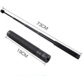 Black aluminium retractable selfie stick extended to full length with phone attached, showing included tripod stand and wireless remote.