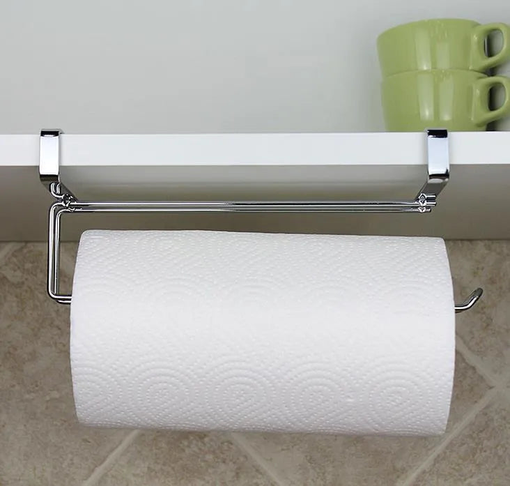 Silver stainless steel kitchen towel rack mounted on a white cabinet door.