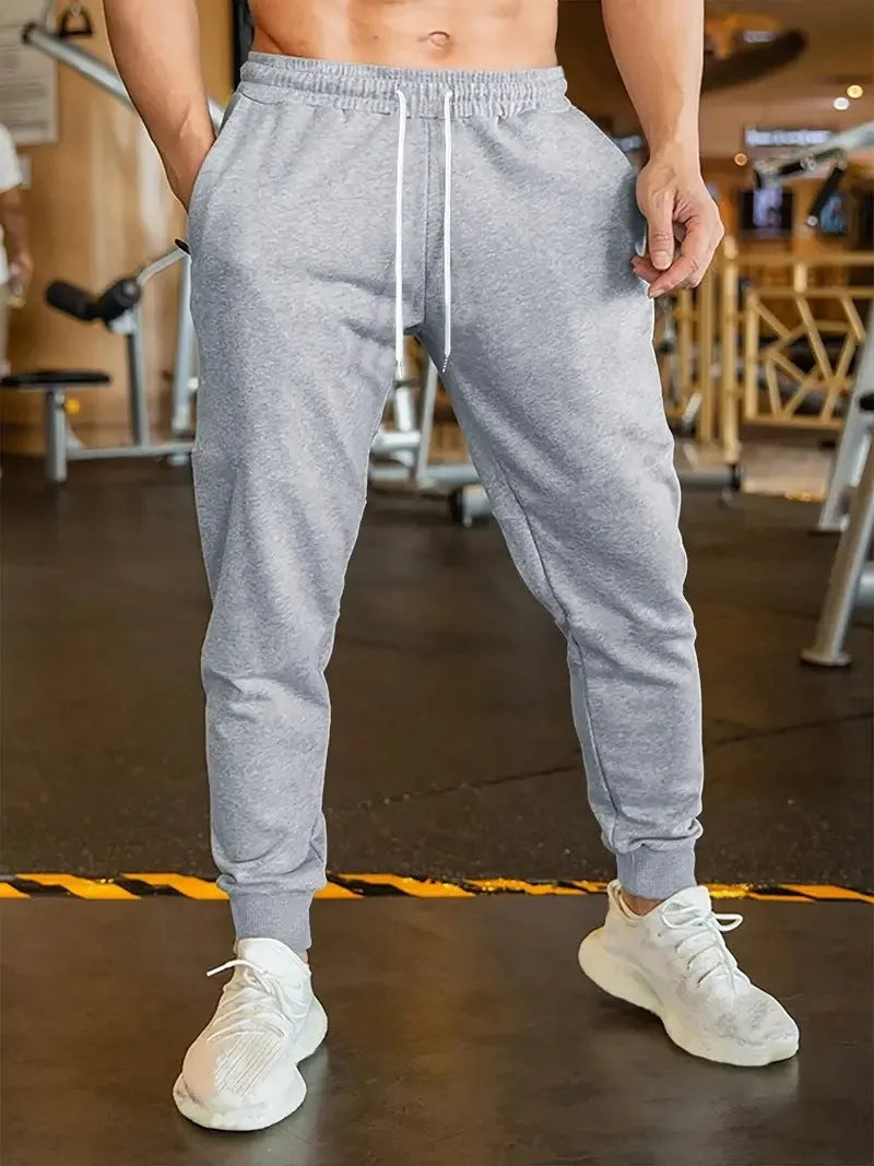Men's linen-style leisure trousers with drawstring waist in loose fit casual design