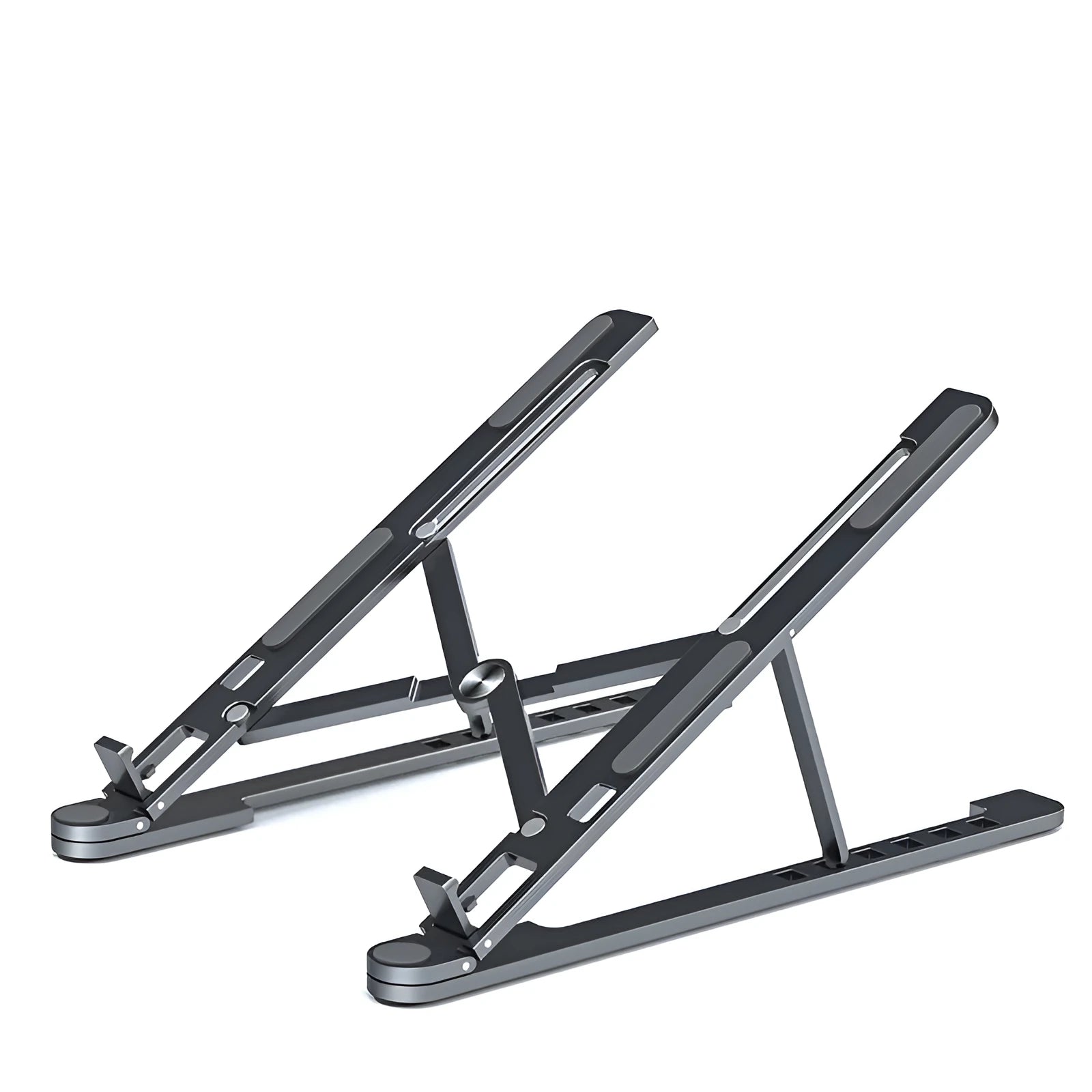 A folded aluminium laptop stand in silver next to an open laptop, demonstrating its compact size.