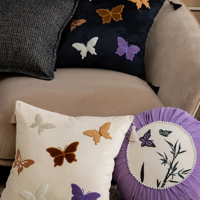 Square butterfly embroidered cushion in beige, black, or purple colour options