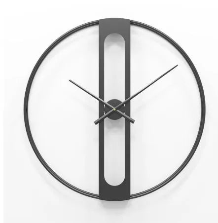 Large 50cm round metal wall clock in black or gold finish on a wall