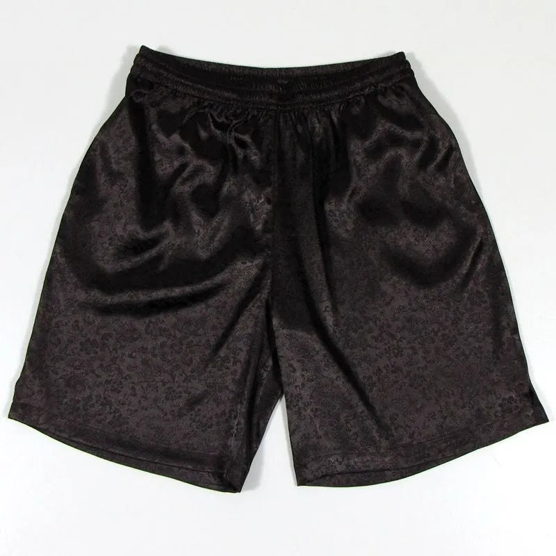 Men's black elastic drawstring Tai Chi shorts made from lightweight polyester fabric.