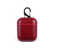 Genuine leather charging case for Apple AirPods in black, brown, light brown, and red colours