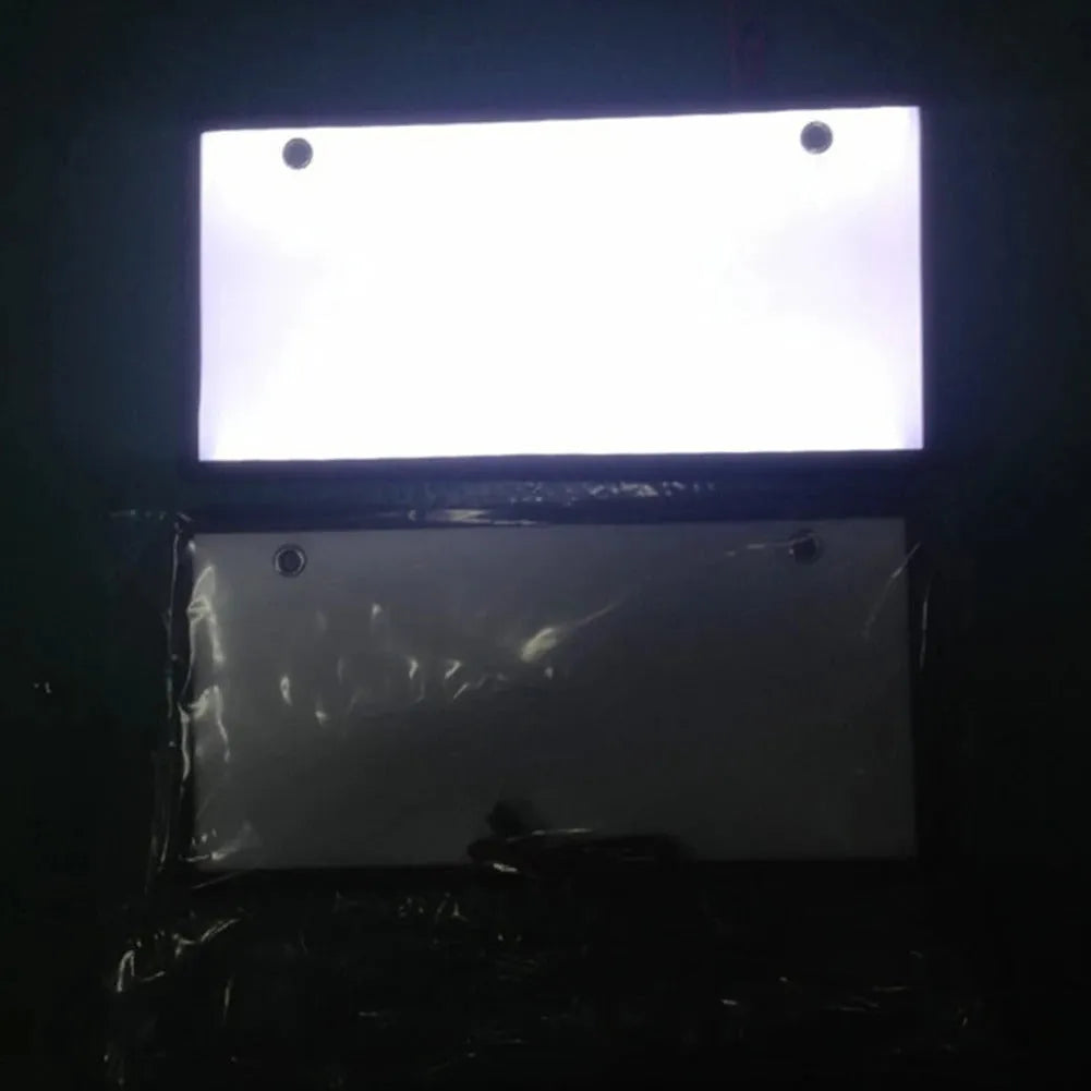 Two flat LED truck license plate light bars with plastic housing.