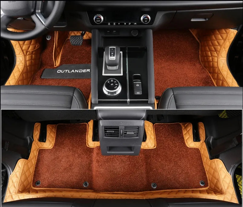Custom black PU floor mats fitted in a Mitsubishi Outlander footwell.