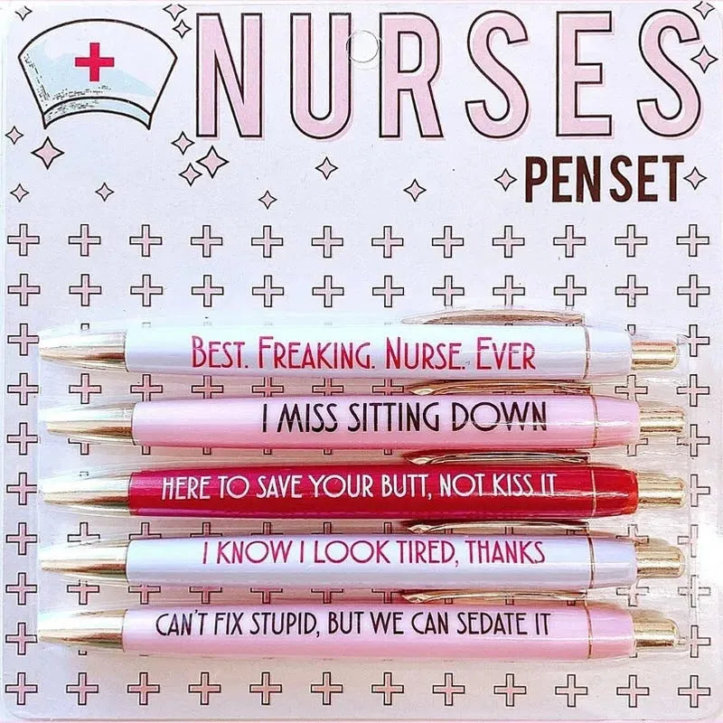 Five nurse-themed retractable ballpoint pens laid out, showing humorous medical designs.