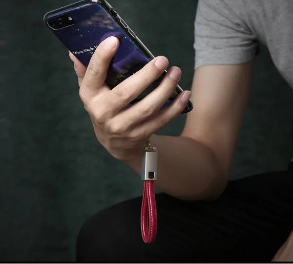 Leather wrapped iPhone charging cable with zinc alloy connector showing 20cm length