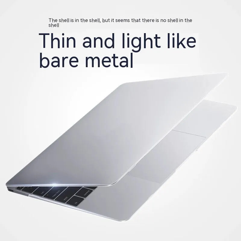 Hard plastic protective case fitted on a silver MacBook Pro laptop, showing clear transparent finish.