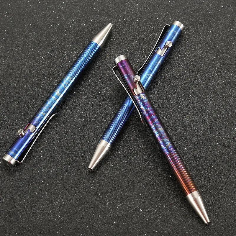Titanium alloy tactical pen with gun bolt handle in a phantom colour finish.