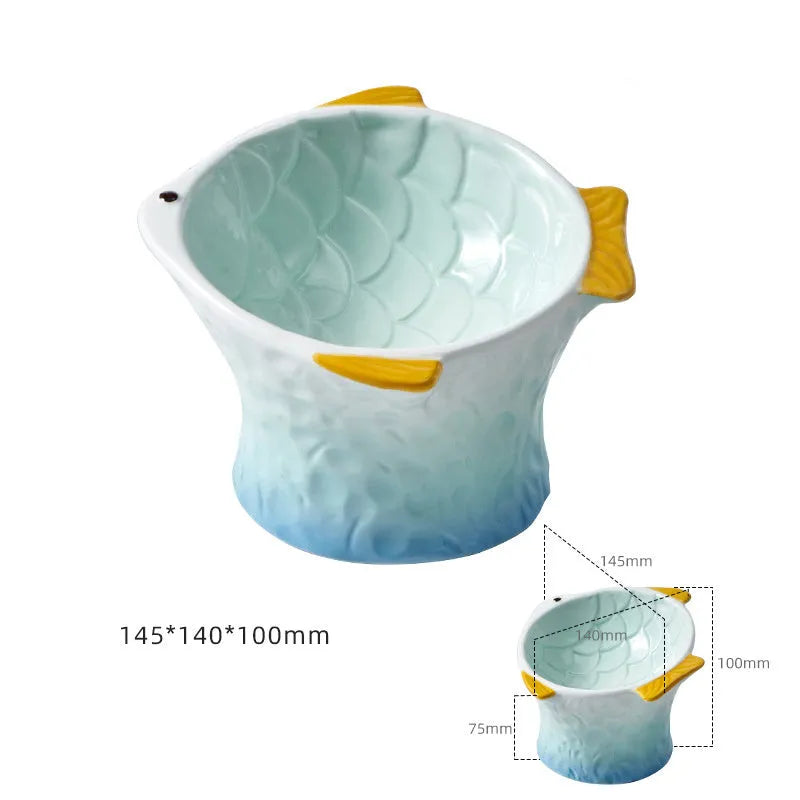 Blue fish-shaped ceramic cat bowl with 15-degree tilt angle and elevated design