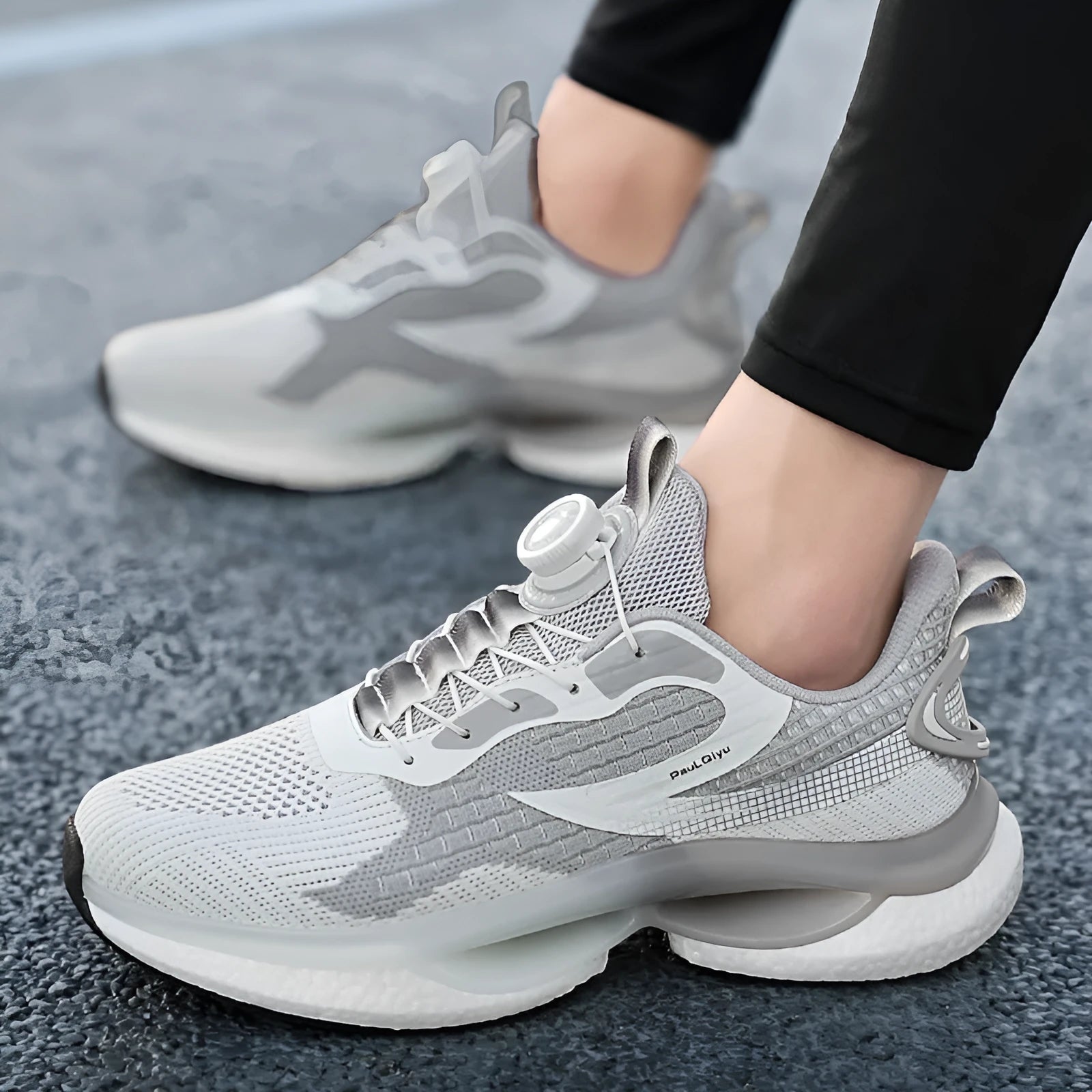 Men's white rotating button running shoes with breathable mesh upper and buckle fastening