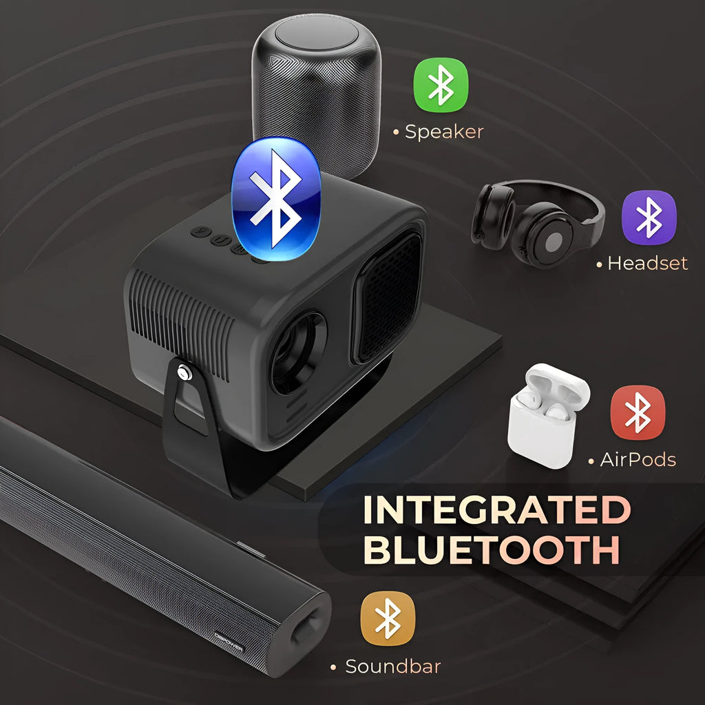 Black portable HD projector with remote control on desk