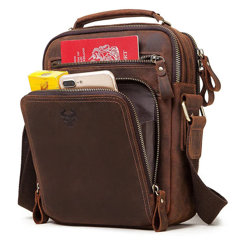 Men's brown Crazy Horse leather crossbody bag with sewing line details and crossbody strap