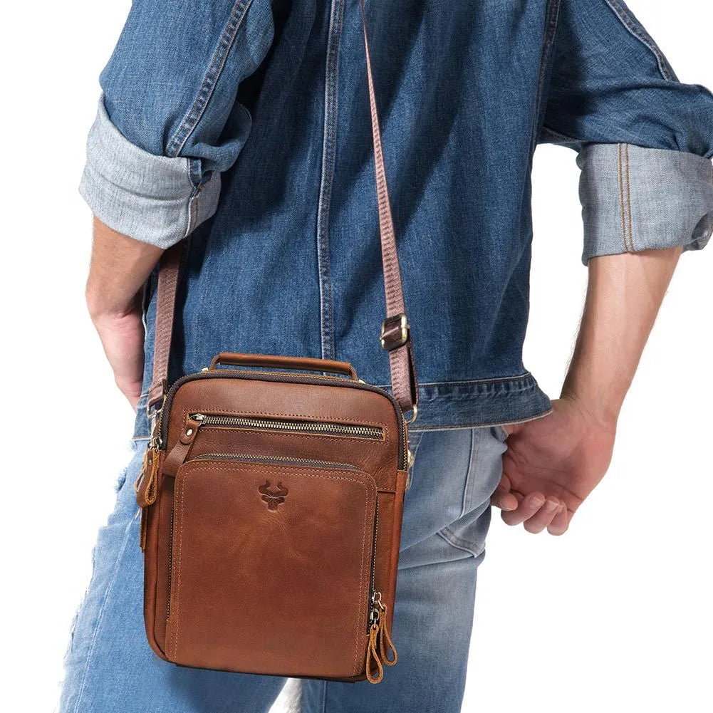 Men's brown Crazy Horse leather crossbody bag with sewing line details and crossbody strap