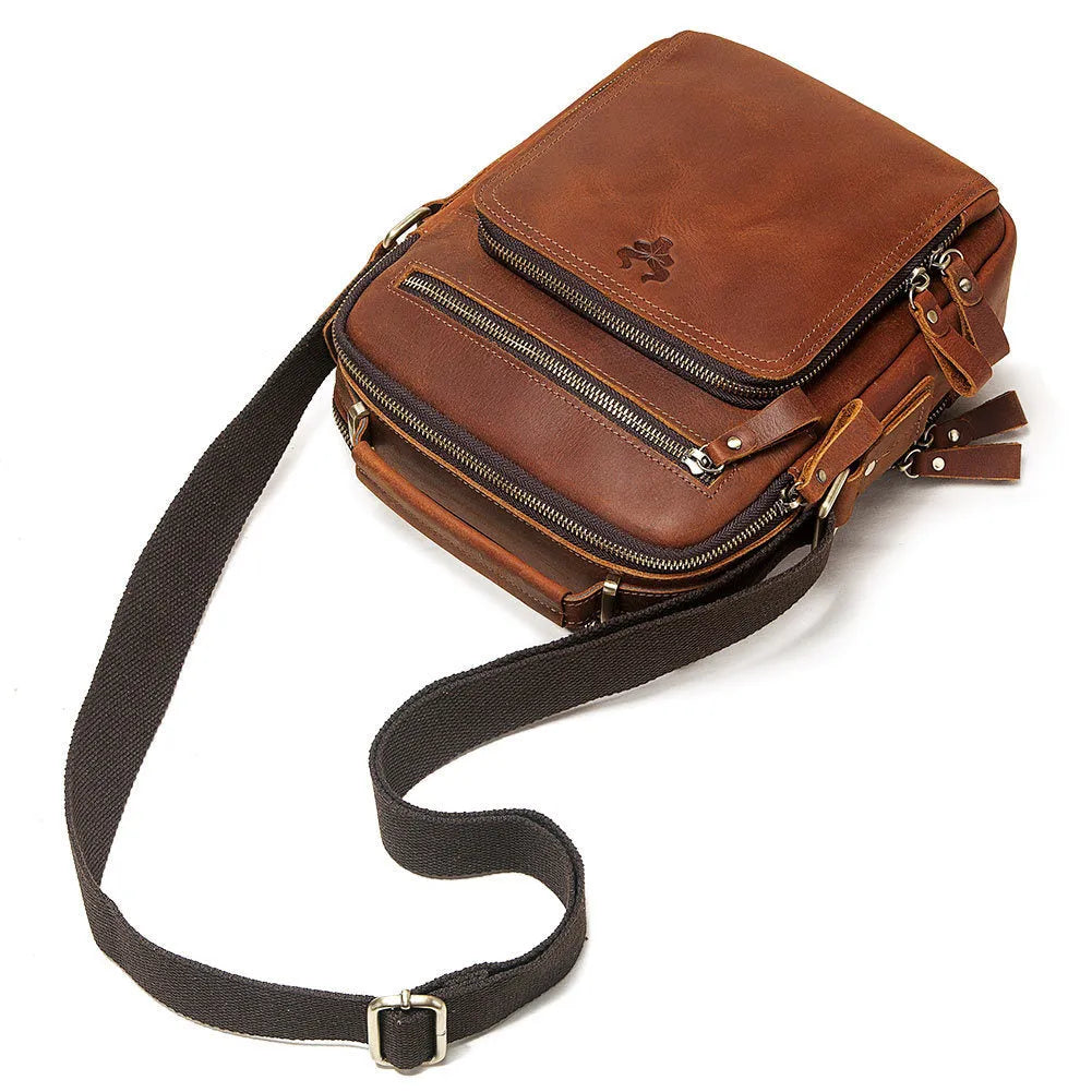 Men's brown Crazy Horse leather crossbody bag with sewing line details and crossbody strap