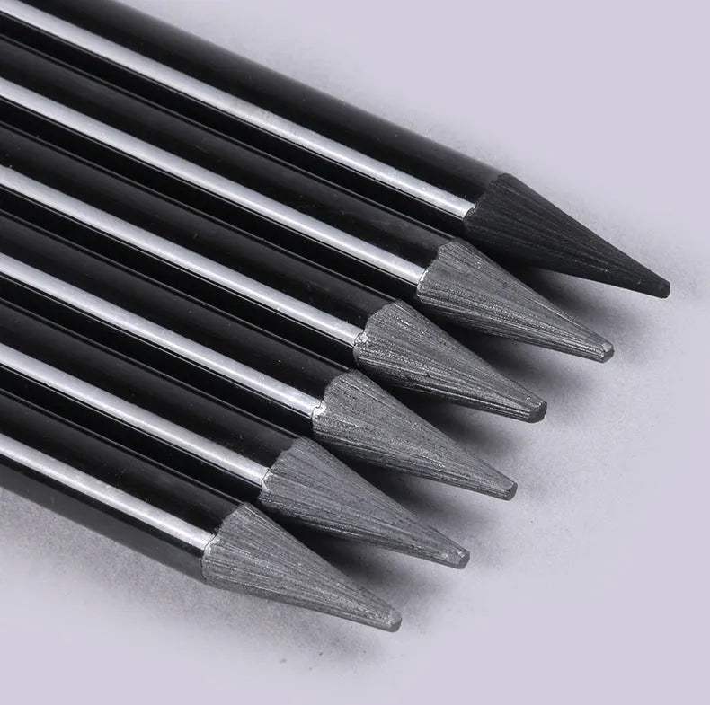 Solid graphite and carbonised drawing pencil set on a suction card pack.