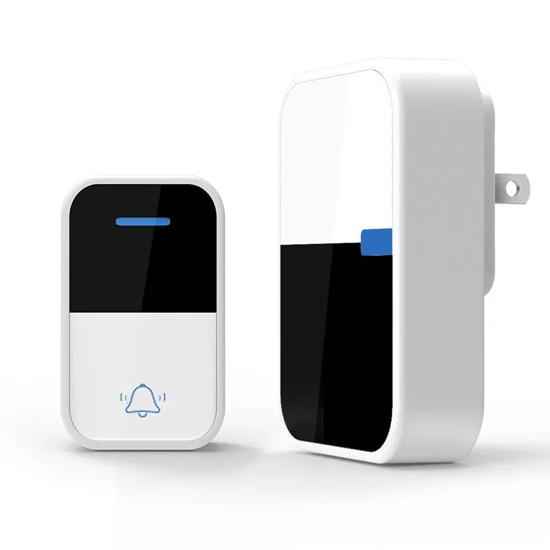 White plastic wireless doorbell receiver and self-generating button on a white background.