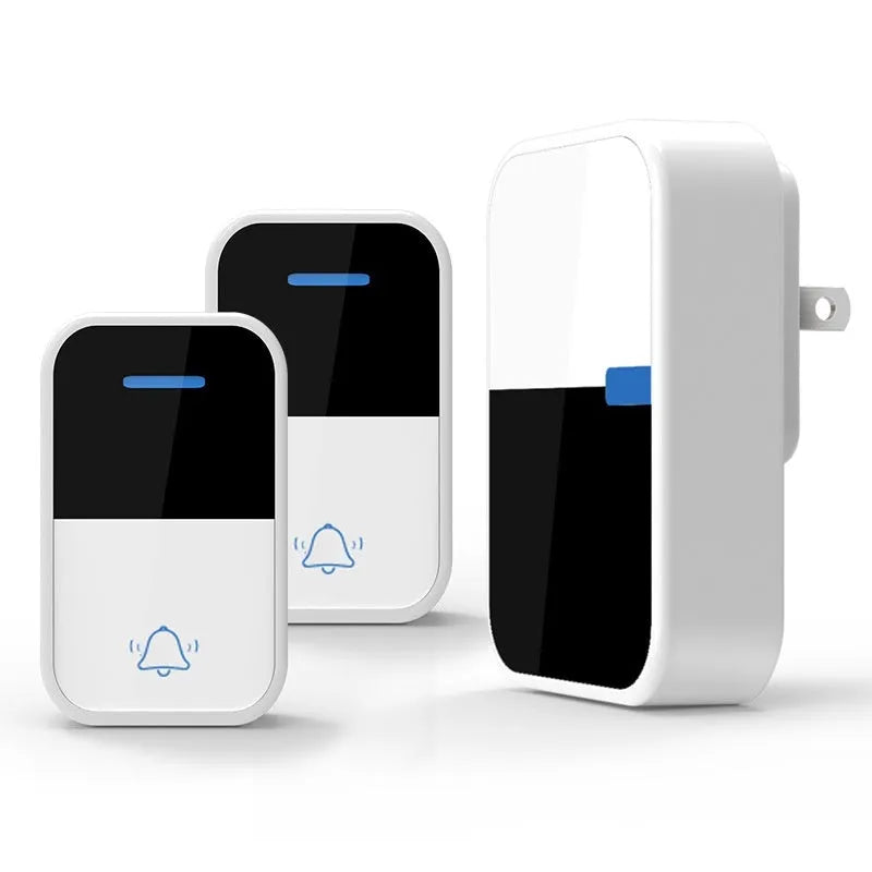 White plastic wireless doorbell receiver and self-generating button on a white background.