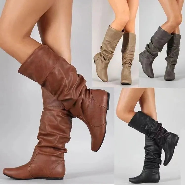 Women's black slip-on flat ankle boots with high shaft and round toe