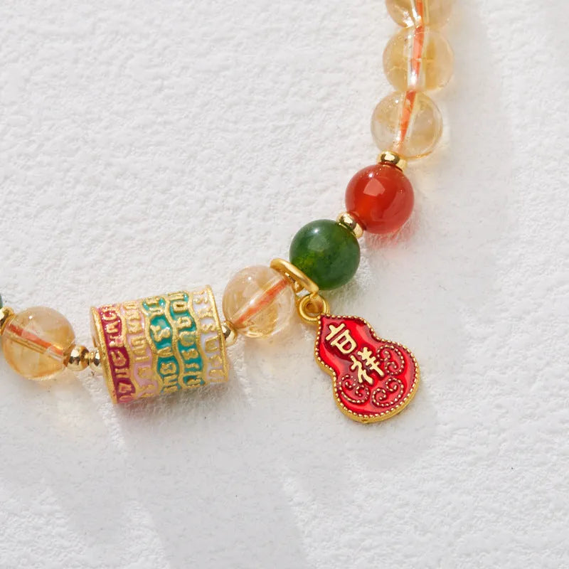 Hand-woven citrine five sutra bracelet with 6mm crystal beads in geometric pattern