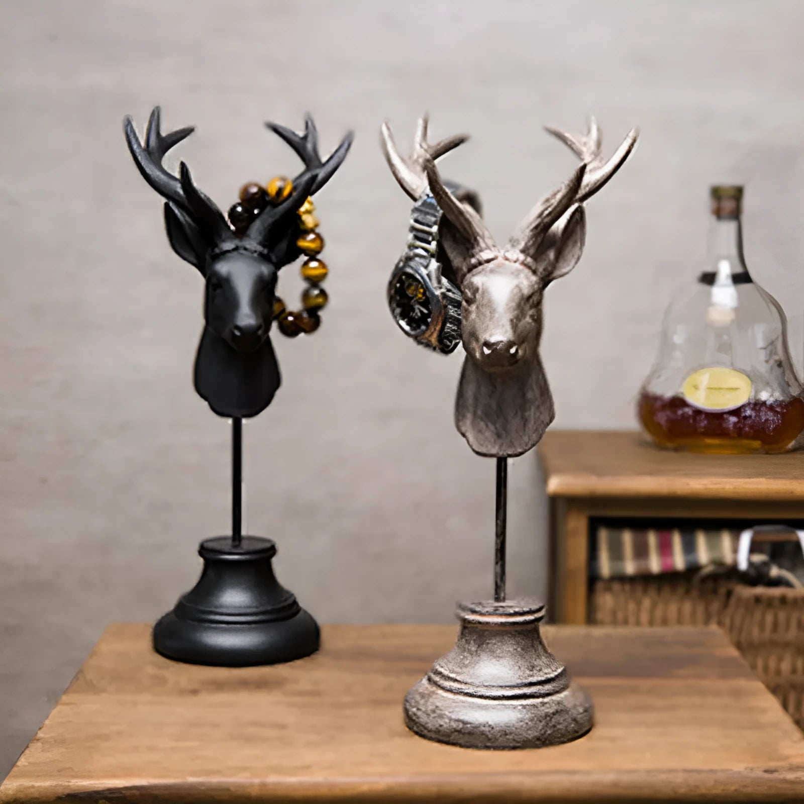 Natural resin decorative animal sculpture in black, white, or wood colour on a wooden table.