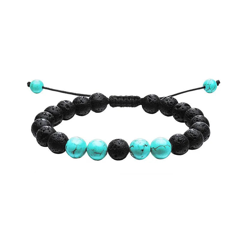 Pair of matte black agate bead bracelets with geometric design for couples.
