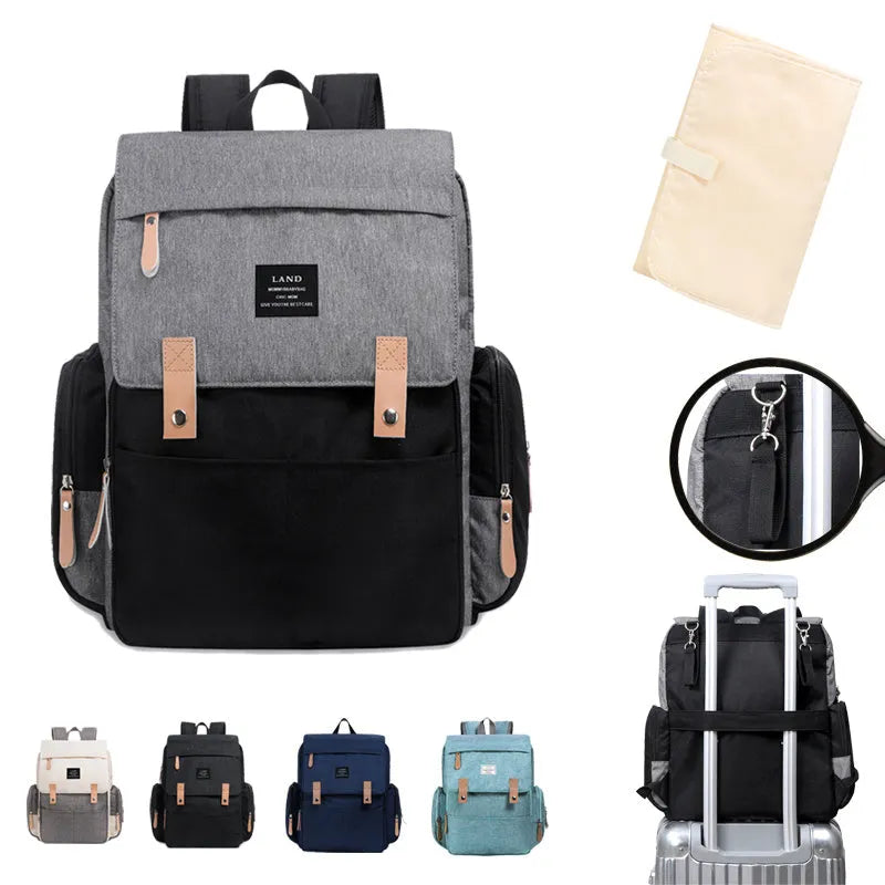 Large Oxford cloth diaper backpack with changing mat in beige colour, dimensions 33x39x15cm