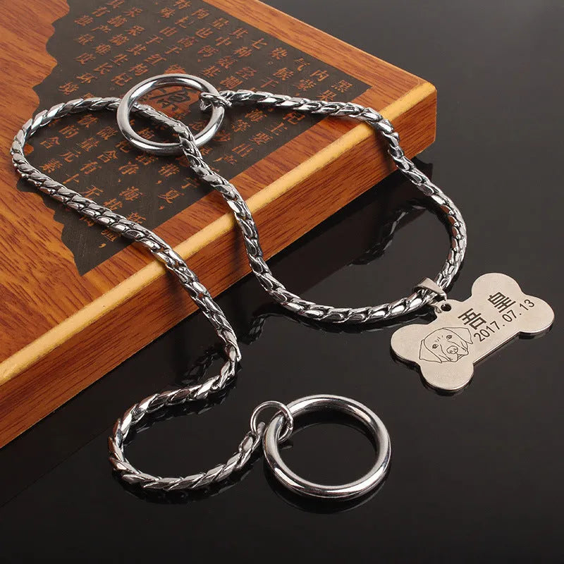 Metal dog collar in silver finish on white background with metal buckle