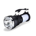 Black solar-powered LED flashlight with USB charging port on a durable ABS plastic body.