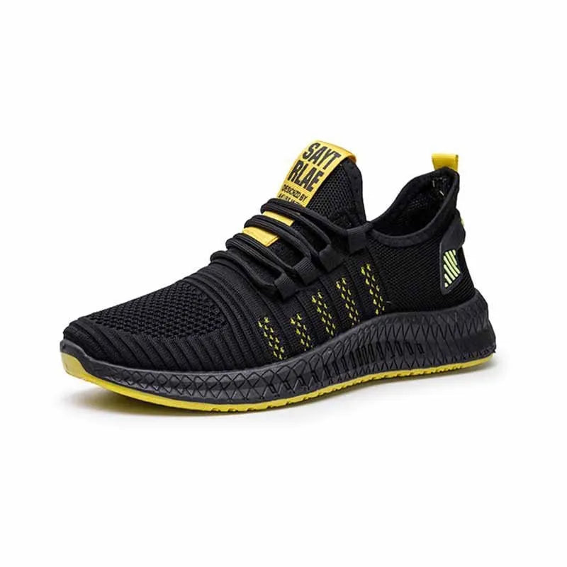 Men's black casual trainers with Flying Weave upper and cross strap detail on low-top sports shoes