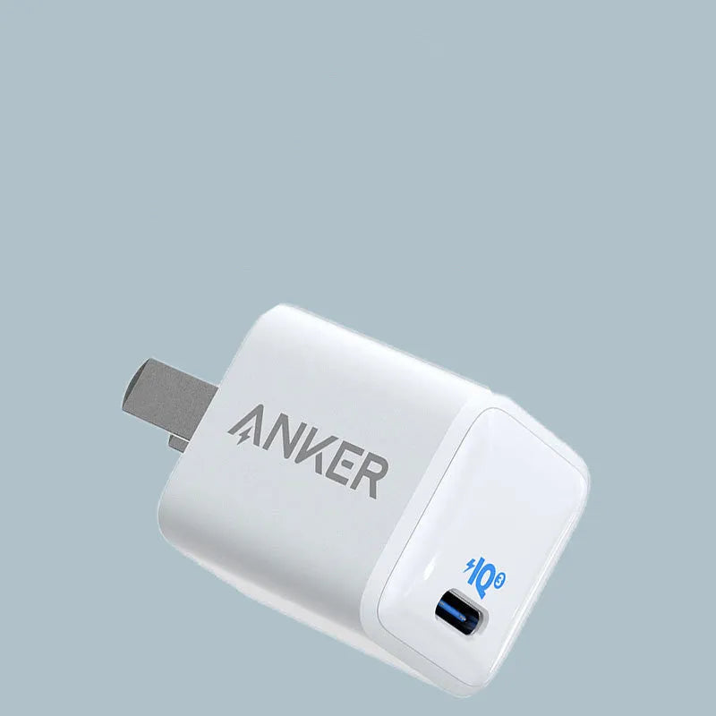 White USB travel charger for mobile phones with 600mA charging current