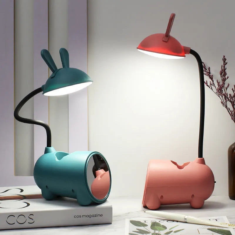 Cartoon-style USB desk lamp with integrated pen container in modern simplicity design