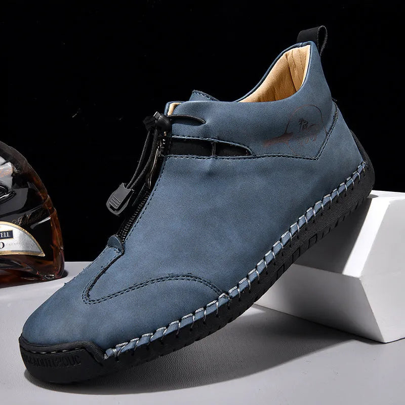 Men's green casual leather shoes with a round pointed toe and a mid-heel for height increase.