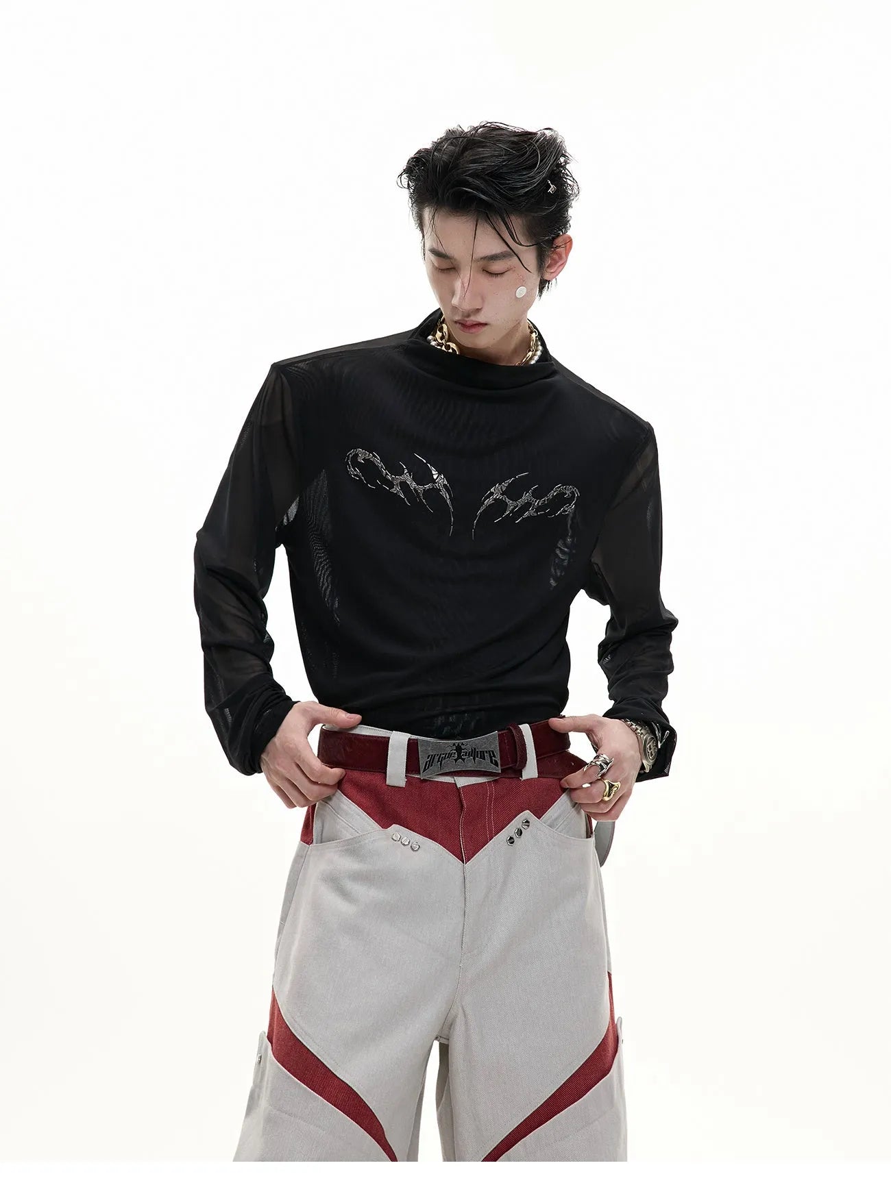 Men's black mesh slim-fit long-sleeved bottoming shirt on a hanger.