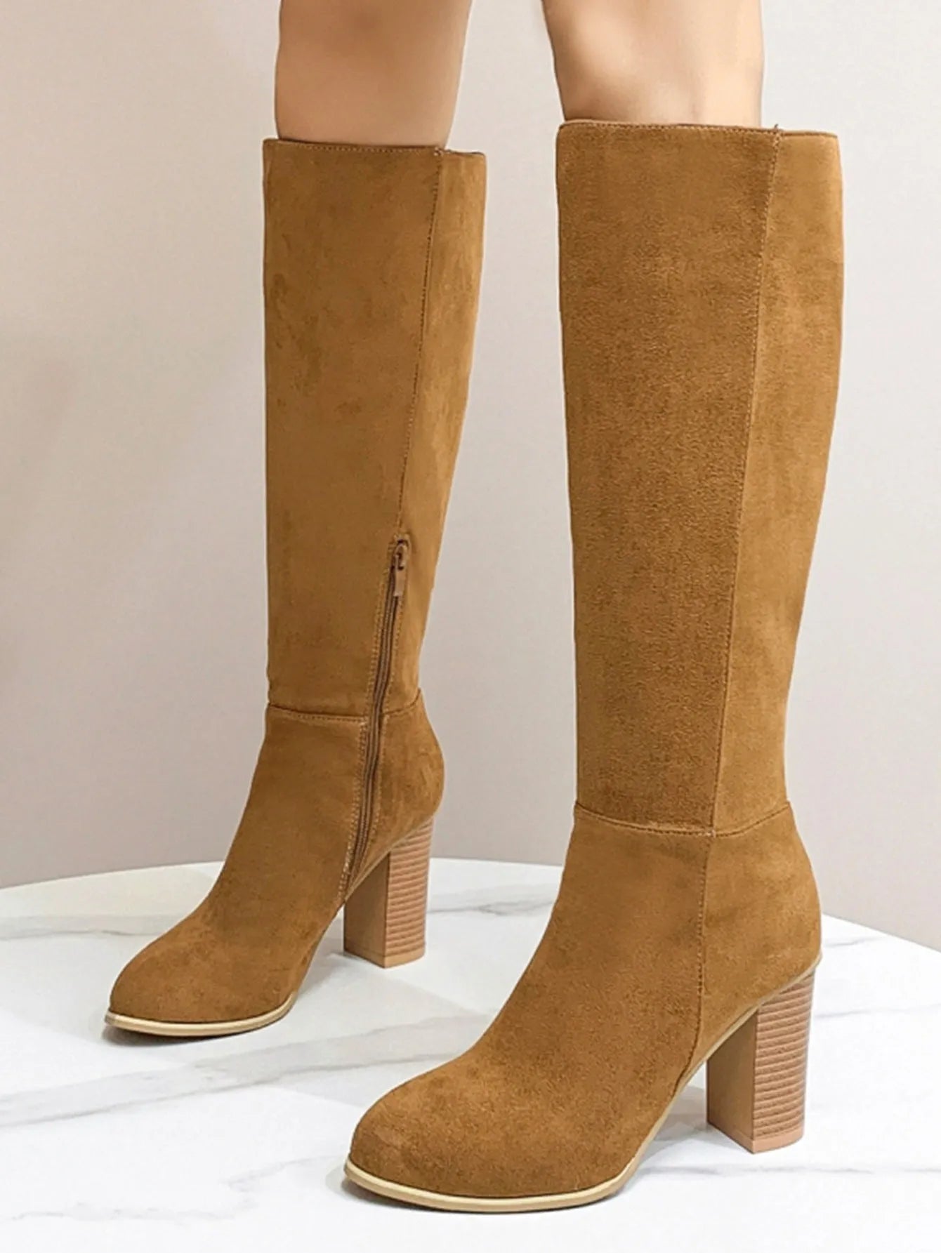 Women's black square toe high heel fashion boots made from artificial PU leather
