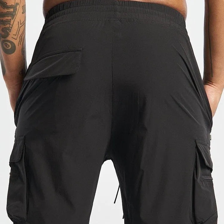 Men's black sports shorts with four-sided elastic fabric and mid waist quick-dry design