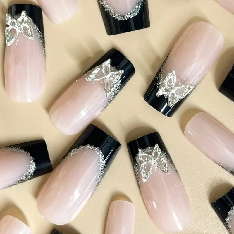 Black French style thin glittering butterfly nail armour set on medium-length nails