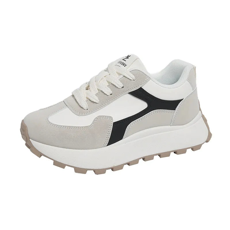 Women's low-top sports running shoes with mesh lining and front lace-up closure in solid colour options