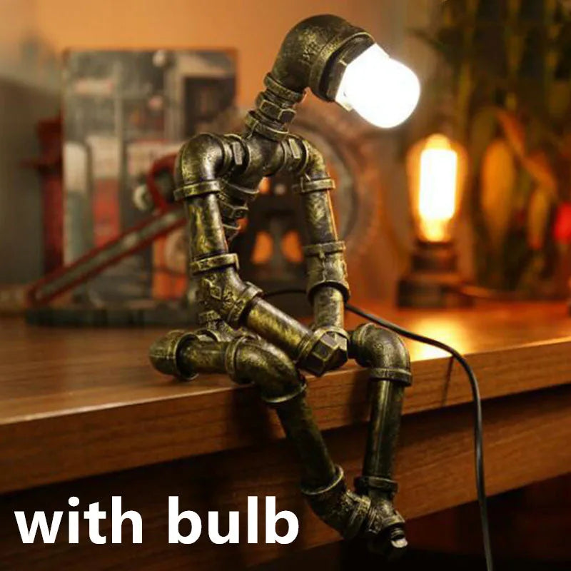 Vintage industrial robot table lamp with iron pipe design and water pipe light filtering